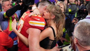 FILE - Taylor Swift embraces Kansas City Chiefs tight end Travis Kelce after the NFL Super Bowl 58 football game against the San Francisco 49ers, Sunday, Feb. 11, 2024, in Las Vegas. The Chiefs won 25-22. (AP Photo/John Locher)