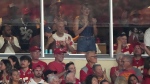 Taylor Swift is seen in a suite during the first half of an NFL football game between the Kansas City Chiefs and the Baltimore Ravens Thursday, Sept. 5, 2024, in Kansas City, Mo. (AP Photo/Charlie Riedel)