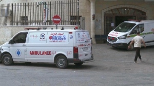 This image taken from an Associated Press video shows Aysenur Ezgi Eygi's body being transported through the Rafidia Surgical Hospital, Sept. 6, 2024, in the West Bank city of Nablus. (AP Photo/Aref Tufaha)