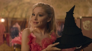 This image released by Universal Pictures shows Ariana Grande as Glinda in the film "Wicked." (Universal Pictures via AP)