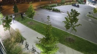 A still from a video released by Toronto police show two individuals opening fire at a plaza in North York on Aug. 27, 2024. (Toronto Police Service)