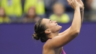 Aryna Sabalenka, of Belarus, reacts after defeating Jessica Pegula, of the United States, to win the women's singles final of the U.S. Open tennis championships, Saturday, Sept. 7, 2024, in New York. (AP Photo/Seth Wenig)