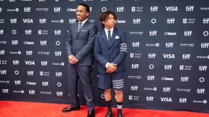 Anderson .Paak and Soul Rasheed arrive on the red carpet for the premiere of "K Pops" at the Princess of Wales Theatre, during the Toronto International Film Festival, in Toronto, on Saturday Sept. 7, 2024. THE CANADIAN PRESS/Paige Taylor White