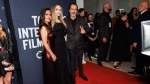 Salma Hayek Pinault, Angelina Jolie, and Demian Bichir on the red carpet for the premiere of 'Without Blood' at TIFF Lightbox, during the Toronto International Film Festival, in Toronto, on Sunday, Sept. 8, 2024. THE CANADIAN PRESS/Cole Burston