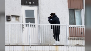 A coroner's report into the death of a Quebec provincial police officer and a man with mental health issues who killed her is being released today. An investigator examines the scene in Louiseville, Que., Tuesday, March 28, 2023. THE CANADIAN PRESS/Ryan Remiorz