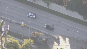 One woman is in hospital in life-threatening condition following a shooting on the QEW in Mississauga early Tuesday morning. 