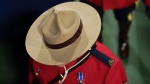 A RCMP officer leaves the court at the National Bank Open, in Toronto, Monday, Aug. 12, 2024. THE CANADIAN PRESS/Chris Young