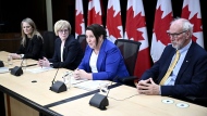 Justice Lise Maisonneuve, who will lead the Future of Sport in Canada Commission, participates in a news conference with Minister of Sport and Physical Activity Carla Qualtrough, second from left, and special advisors Noni Classen, left, and Dr. Andrew Pipe, at the National Press Theatre in Ottawa, on Thursday, May 9, 2024. THE CANADIAN PRESS/Justin Tang