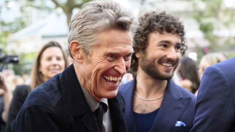 Willem Dafoe and Gabriel LaBelle arrive on the red carpet for the film 'Saturday Night' at the Toronto International Film Festival, in Toronto on Tuesday, September 10, 2024. (THE CANADIAN PRESS/Christopher Katsarov)