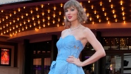 Taylor Swift arrives at the world premiere of the concert film 