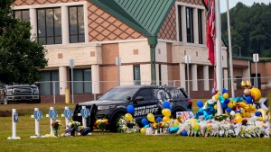 A memorial now sits outside Apalachee High School in Winder, Georgia. (Mike Stewart/AP via CNN Newsource)
