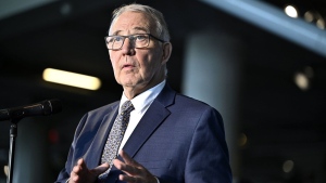 Defence Minister Bill Blair participates in a media availability at the Canadian War Museum in Ottawa, on Thursday, July 18, 2024. Blair says Canada is working on incorporating artificial intelligence in its military, but the technology wonմ replace humans. THE CANADIAN PRESS/Justin Tang