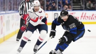 Washington Capitals forward Max Pacioretty (67) and Toronto Maple Leafs defenceman Mark Giordano (55) watch the puck during third-period NHL hockey action in Toronto on Thursday, March 28, 2024. The Maple Leafs have signed Pacioretty to a professional tryout. THE CANADIAN PRESS/Nathan Denette