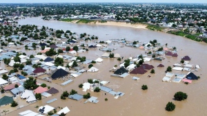 Houses are partially submerged following a dam collapse in Maiduguri, Nigeria, Tuesday, Sept 10, 2024. (AP Photos/ Musa Ajit Borno)