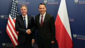 Polish Foreign Minister Radosław Sikorski, right, welcomes U.S. Secretary of State Antony Blinken, left, for talks in Warsaw, Poland on Sept. 12, 2024. (Czarek Sokolowski / AP Photo)