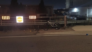 A bicycle sits near the spot where a cyclist was struck by a vehicle that fled the scene Wednesday September 12, 2024. (@OPP_HSD /X)