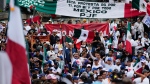 Judicial workers protest the government's judicial reform, which was approved in the Senate and would make judges stand for election, in Mexico City, Wednesday, Sept. 11, 2024. (AP Photo/Eduardo Verdugo) 