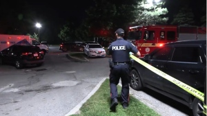 Police are pictured at the scene of a shooting in the area of Chalkfarm Drive and Jane Street Thursday September 12, 2024. 