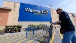 People shop at a Walmart in Vaughan, Ont., on Wednesday, July 2, 2024. THE CANADIAN PRESS/Christopher Katsarov 