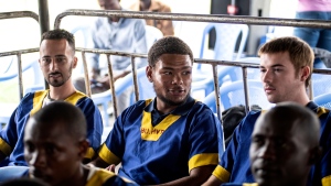 Tyler Thompson, left, Marcel Malanga and Benjamin Reuben Zalman-Polun, all American citizens, attend a court verdict in Congo, Kinshasa, Friday Sept .13, 2024, on charges of taking part in a coup attempt in May 2024. (AP Photo/Samy Ntumba Shambuyi) 