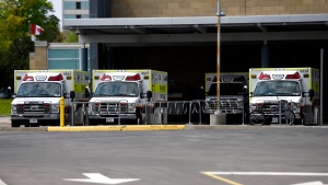 Ambulances are parked outside the Emergency Department at the Ottawa Hospital Civic Campus in Ottawa on May 16, 2022. (The Canadian Press/Justin Tang)