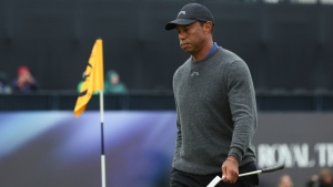 FILE - Tiger Woods of the United States walks from the 18th green following his opening round of the British Open Golf Championships at Royal Troon golf club in Troon, Scotland, Thursday, July 18, 2024. (AP Photo/Scott Heppell)