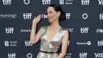 Lucy Liu poses for photographs on the red carpet for the movie 'Presence' during the Toronto International Film Festival in Toronto on Friday, September 13, 2024. (THE CANADIAN PRESS/Nathan Denette)