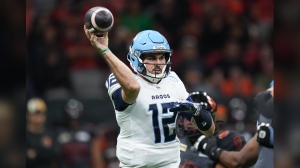 Toronto Argonauts quarterback Chad Kelly passes during the first half of a CFL football game against the B.C. Lions, in Vancouver, on Friday, September 13, 2024. THE CANADIAN PRESS/Darryl Dyck