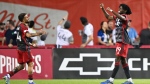 Toronto FC forward Lorenzo Insigne (24) celebrates with forward Deandre Kerr (29) after Kerr scored during first half MLS soccer action against Austin FC in Toronto on Saturday, September 14, 2024. THE CANADIAN PRESS/Chris Katsarov