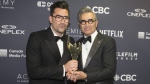 Daniel Levy and Eugene Levy pose for a photo after winning the Award for "Best Comedy Series" at the Canadian Screen Awards in Toronto on Sunday, March 31, 2019. The Canadian father-and-son duo will host the Emmy Awards ceremony tonight, which airs on CTV at 8 p.m. ET.THE CANADIAN PRESS/Chris Young
