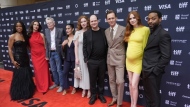 The Pocket Queen, from left, Kate Siegel, Stephen King, Q'orianka Kilcher, Annalise Basso, Mike Flanagan, Tom Hiddleston, Karen Gillan, and Chiwetel Ejiofor attend the premiere of "The Life of Chuck" during the Toronto International Film Festival on Friday, Sept. 6, 2024, at Princess of Wales Theatre in Toronto. (AP Photo/Chris Pizzello)
