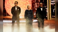 Antony Starr, from left, Kathy Bates, and Giancarlo Esposito present the award for outstanding supporting actress in a limited or anthology series or movie during the 76th Primetime Emmy Awards on Sunday, Sept. 15, 2024, at the Peacock Theater in Los Angeles. (AP Photo/Chris Pizzello)