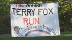 A Terry Fox Run banner.