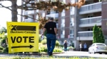 A voter looks at the ballot list as they head to advance polls in Lasalle, Que., Monday, Sept. 9, 2024. People in two federal ridings are choosing their next member of Parliament today, and political parties are closely watching the results. THE CANADIAN PRESS/Christinne Muschi
