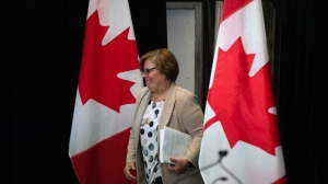 Commissioner Justice Marie-Josee Hogue arrives for a session as the Foreign Interference commission begins fall hearings, Monday, September 16, 2024 in Ottawa. THE CANADIAN PRESS/Adrian Wyld