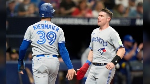 The Toronto Blue Jays claimed Tyler Heineman off waivers from the Boston Red Sox on Monday and designated fellow catcher Brian Serven for assignment. Toronto Blue Jays' Kevin Kiermaier (39) and Heineman celebrate after scoring on a two-run double by George Springer off Tampa Bay Rays relief pitcher Shawn Armstrong during the sixth inning of a baseball game, in St. Petersburg, Fla., Saturday, Sept. 23, 2023. THE CANADIAN PRESS/AP-Chris O'Meara