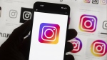 The Instagram logo is seen on a cellphone in Boston on Oct. 14, 2022. THE CANADIAN PRESS/AP/Michael Dwyer