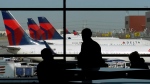 Delta Air Lines planes sit at gates at Salt Lake City International Airport in a 2020 file photo. (George Frey/Bloomberg/Getty Images)