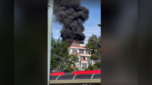 A two-alarm blaze erupted at a mid-rise building at 800 Broadview Ave., just north of Danforth Avenue, on Sept. 18. (Jon Kastikainen/X photo)