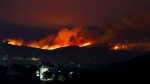 Fires rage on the hills around Sever do Vouga, a town in northern Portugal, on Sept. 17, 2024. (Bruno Fonseca / AP Photo)