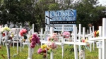 The Crosses for Change site in downtown, a memorial to victims of the opioid crisis, is shown in Sudbury, Ont., Wednesday, Aug. 9, 2023.THE CANADIAN PRESS/Gino Donato