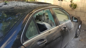 A partly damaged car after what is believed to be the result of a walkie-talkie exploding inside it, in the southern port city of Sidon, Lebanon, Wednesday, Sept. 18, 2024. (Mohammed Zaatari / AP Photo)