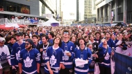 Toronto Maple Leafs fans react as they gather in Maple Leaf Square to watch second round NHL Stanley Cup playoff hockey action against the Florida Panthers in Toronto on Wednesday, May 10, 2023. THE CANADIAN PRESS/Christopher Katsarov