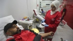 People donate blood for those who were injured by their exploded handheld pagers, at a Red Cross centre, in the southern port city of Sidon, Lebanon on Sept. 17, 2024.