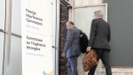 Lawyers enter the hearing room as the Public Inquiry into Foreign Election Interference resumes in Ottawa, Monday, Sept. 16, 2024. A federal inquiry into foreign interference is scheduled to hear today from Bloc Québécois, Green and New Democratic Party officials.THE CANADIAN PRESS/Adrian Wyld