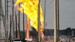 A massive pipeline fire burns on Monday, Sept. 16, in La Porte, Texas. Three days after an SUV crashed into a liquid natural gas pipeline, starting a fire that has been burning ever since, police say human remains were recovered from the vehicle on Thursday. (Brett Coomer/Houston Chronicle/Getty Images via CNN Newsource)
