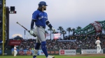 Toronto Blue Jays' Bo Bichette walks to the dugout after striking out against the San Francisco Giants during the sixth inning of a baseball game Tuesday, July 9, 2024, in San Francisco. (AP Photo/Godofredo A. Vásquez)