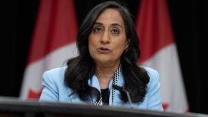 President of the Treasury Board Anita Anand responds to a question during a news conference in Ottawa on June 18, 2024. THE CANADIAN PRESS/Adrian Wyld