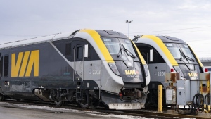 New passenger trains sit on the tracks at the Via Rail Canada Maintenance Centre in Montreal, Thursday, Feb. 22, 2024. The head of Via Rail says a train delay over the Labour Day long weekend was an isolated incident. THE CANADIAN PRESS/Christinne Muschi