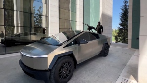 Leader of Russia's Chechnya region Ramzan Kadyrov and what is said to be a Tesla Cybertruck equipped with a machine gun in Grozny, Russia, in a video published on August 17. (Ramzan Kadyrov/Telegram/Reuters via CNN Newsource)